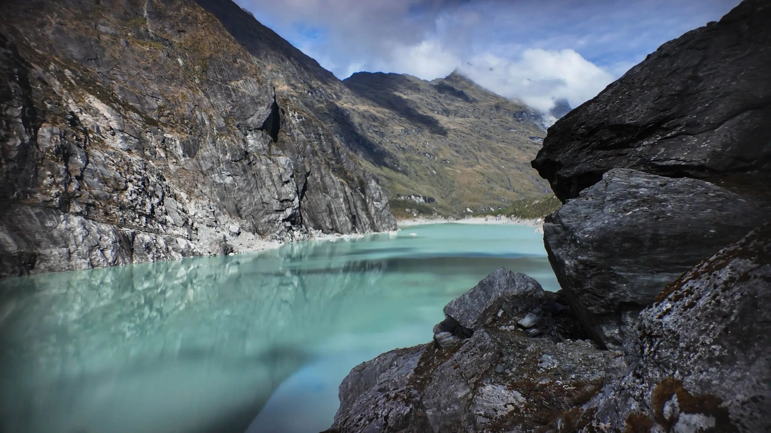 Mountain river valley with text overlay promoting ultralight tents for the wild